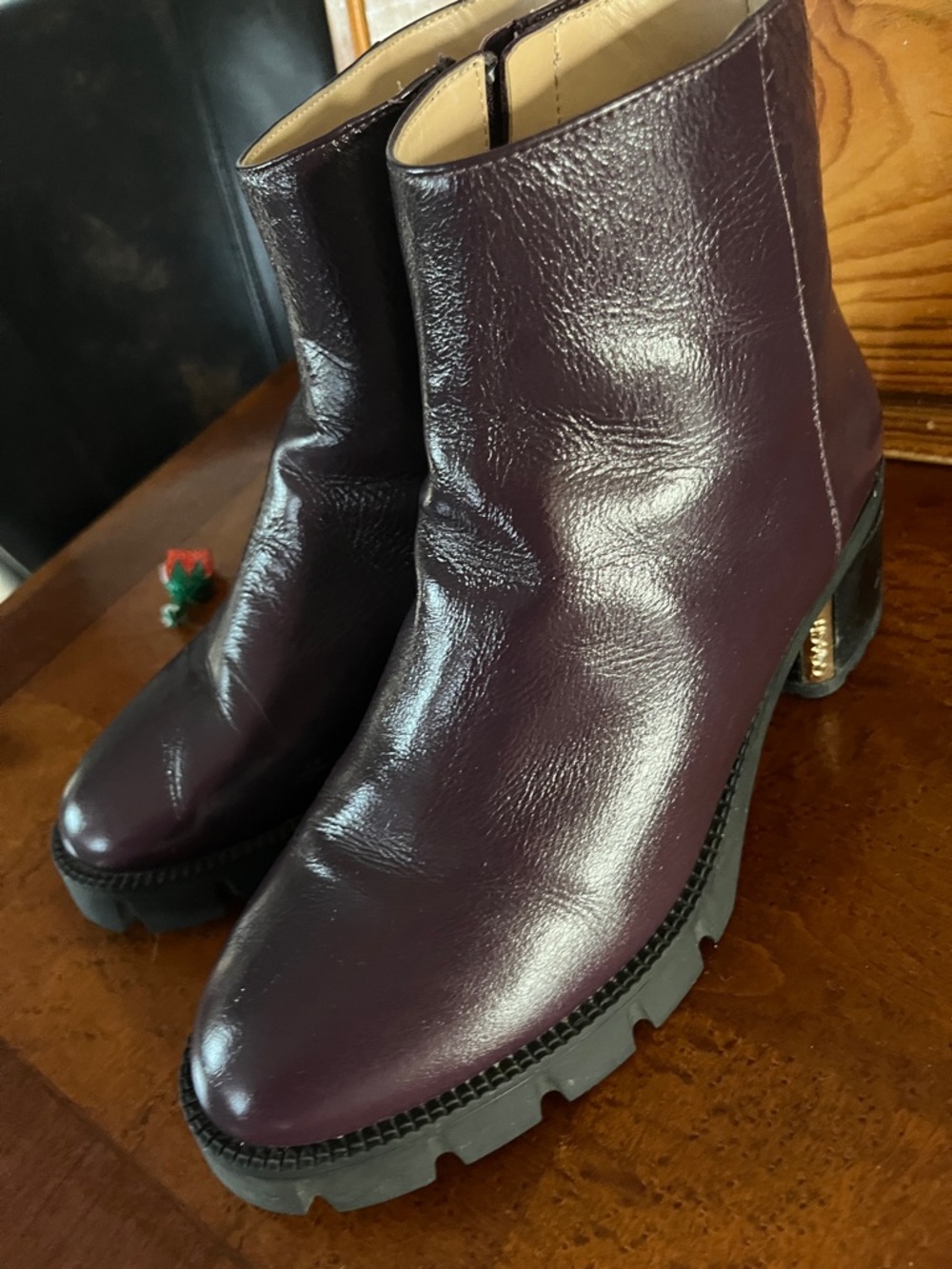Coach Women's Plum/Eggplant Leather Ankle Boots with Gold Heel Accent